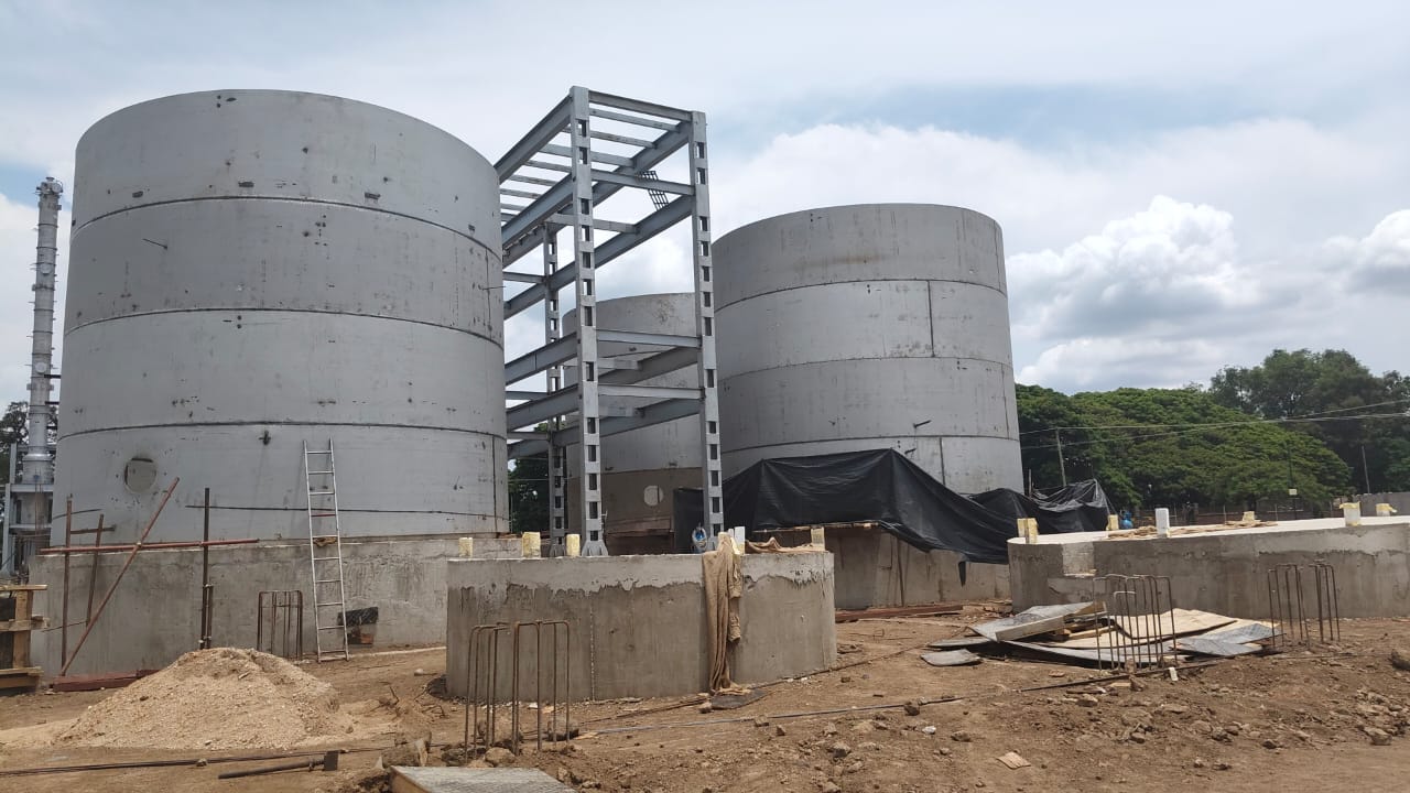 Steel storage tanks and connecting structure under construction